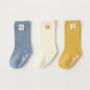 Kids non slip socks with sewing tags