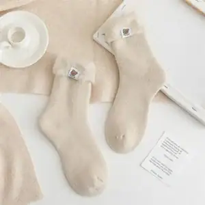 Handmade thermal socks with sewing tags